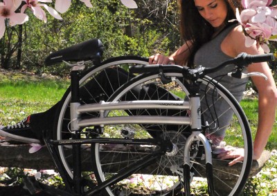 2015 Montague Crosstown folded in grass with woman