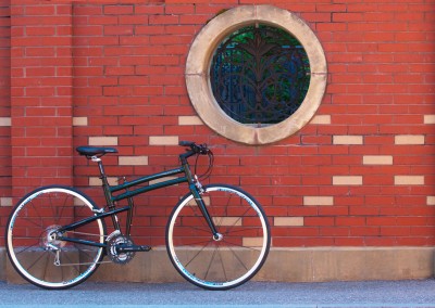 2015 Montague FIT folding bike against brick wall